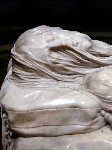 Veiled Christ marble sculpture detail in Naples, Italy.