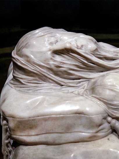 Veiled Christ marble sculpture detail in Naples, Italy.