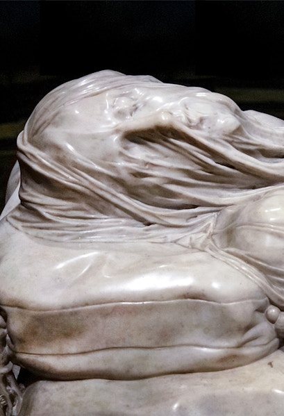Veiled Christ marble sculpture detail in Naples, Italy.