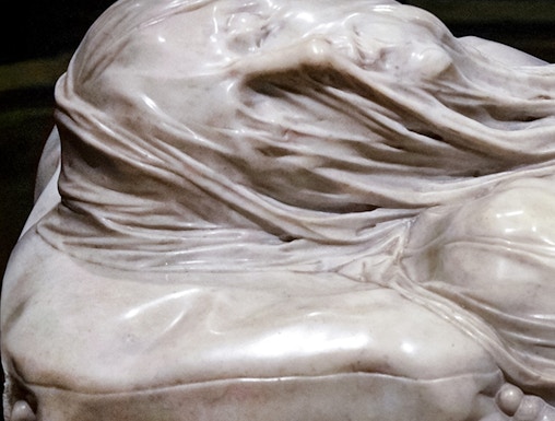 Veiled Christ marble sculpture detail in Naples, Italy.