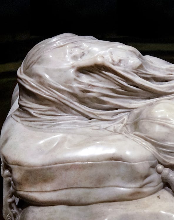 Veiled Christ marble sculpture detail in Naples, Italy.