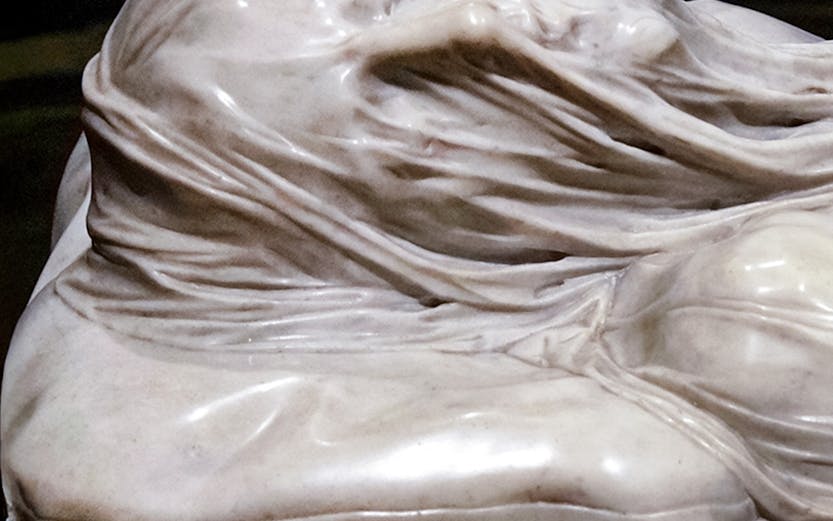 Veiled Christ marble sculpture detail in Naples, Italy.