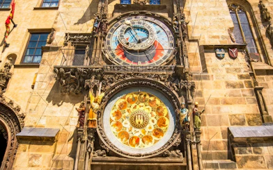 Prague Astronomical Clock with detailed zodiac signs and ornate sculptures.