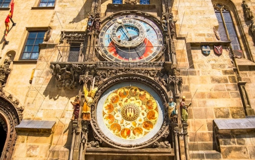 Prague Astronomical Clock with detailed zodiac signs and ornate sculptures.