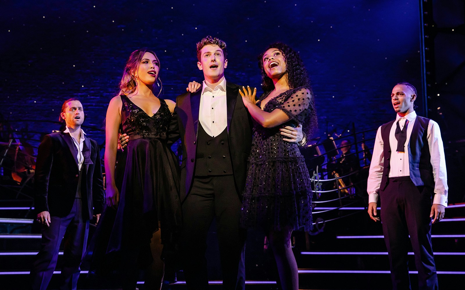 Performers singing on stage during Stephen Sondheim's Old Friends show.