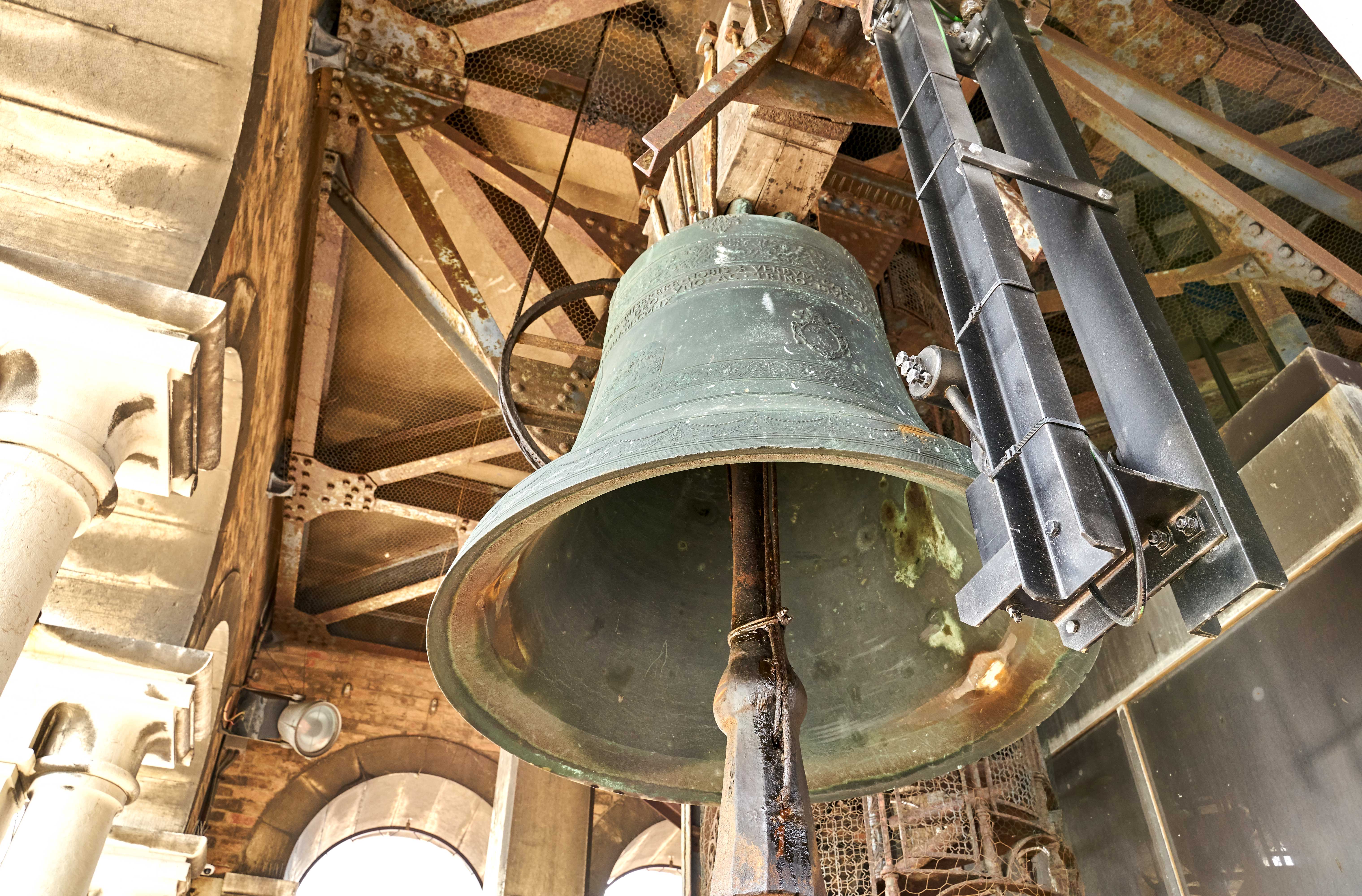 Marangona Bell in St. Mark’s Bell Tower, Venice, Italy, with intricate architectural details.