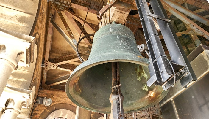 Marangona Bell in St. Mark’s Bell Tower, Venice, Italy, with intricate architectural details.