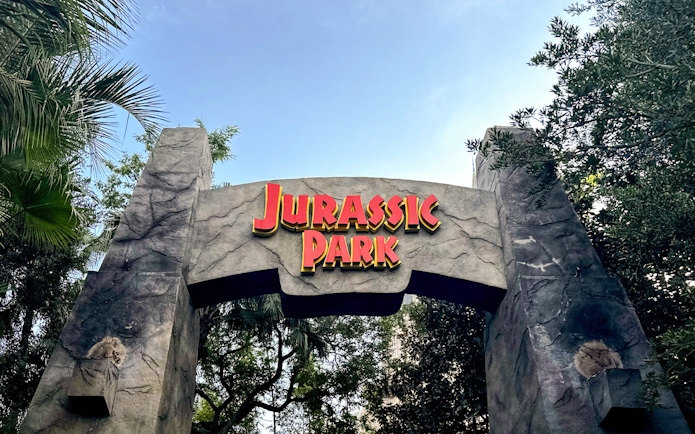 Entrance archway to Jurassic World – The Ride at Universal Studios Hollywood.