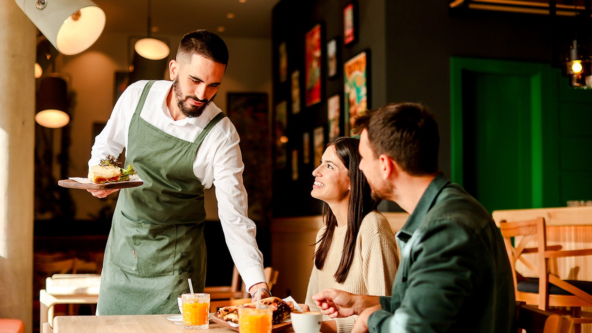 Couple eating in cafe
