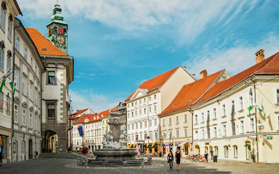 Ljubljana city center with Robba's Fountain and City Hall, Slovenia.
