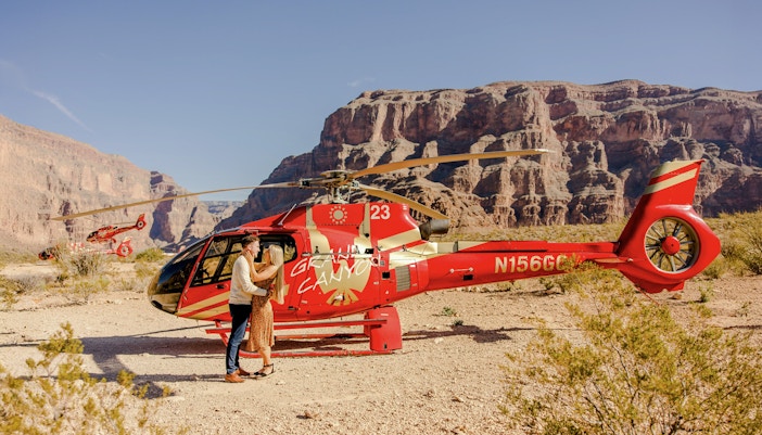 Helicopter on Grand Canyon floor during Las Vegas to Grand Canyon West tour with pontoon boat ride.