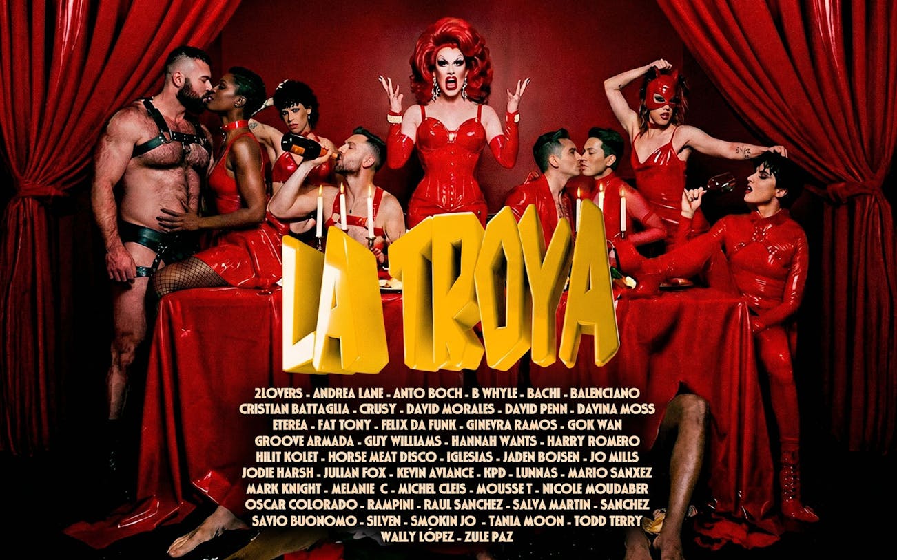 La Troya Club Chinois performers in red costumes, Ibiza nightlife event.