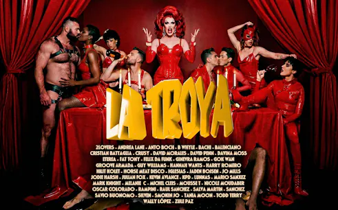 La Troya Club Chinois performers in red costumes, Ibiza nightlife event.