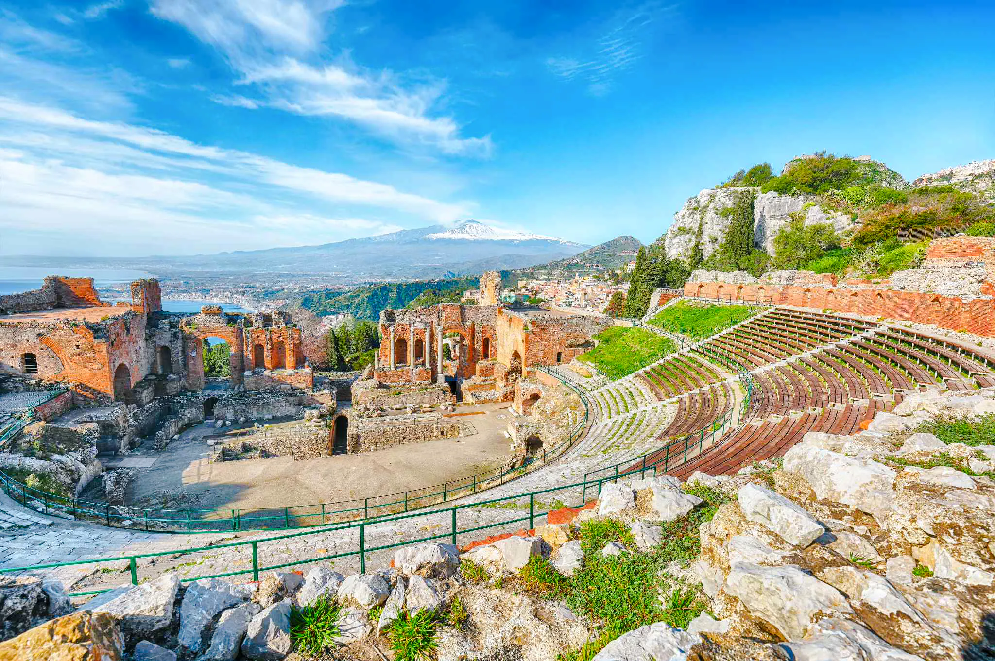 Ancient Greek Theatre in Taormina with Mount Etna view, part of Messina shore excursion.
