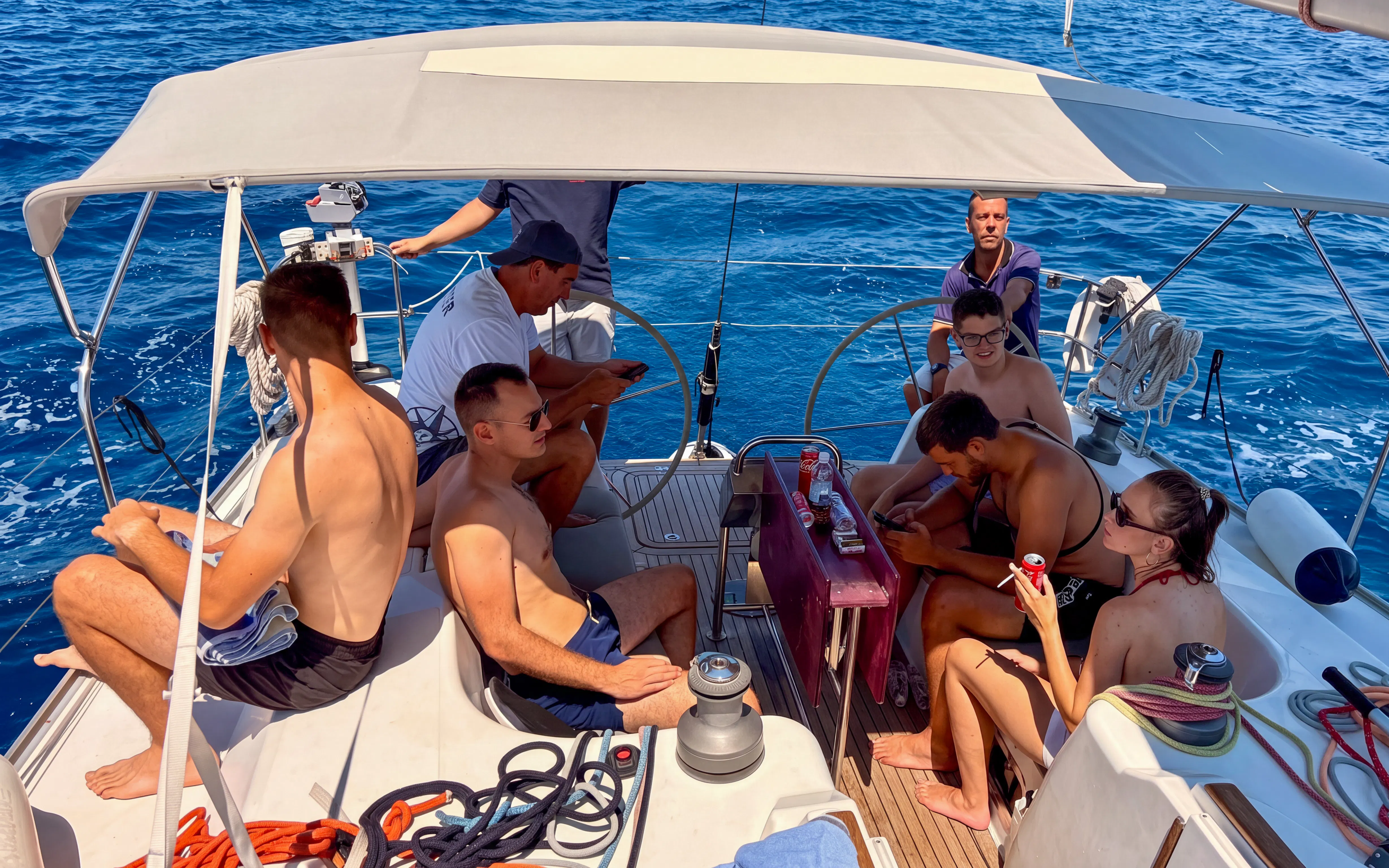 Group enjoying a sailing adventure on a boat near Pula, Croatia.