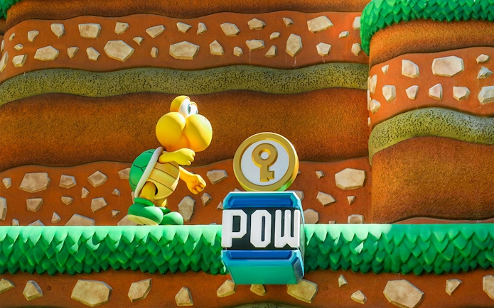 Koopa Troopa character and POW block at Super Mario World, Universal Orlando, Florida.