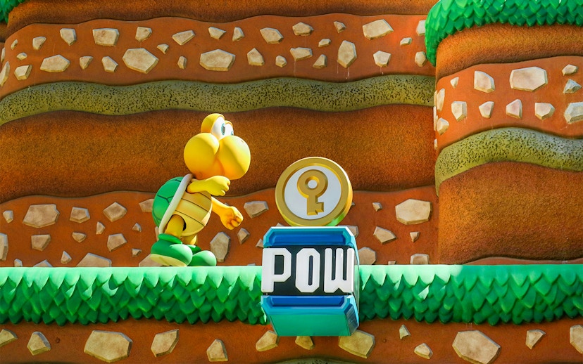 Koopa Troopa character and POW block at Super Mario World, Universal Orlando, Florida.