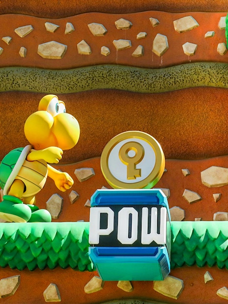 Koopa Troopa character and POW block at Super Mario World, Universal Orlando, Florida.