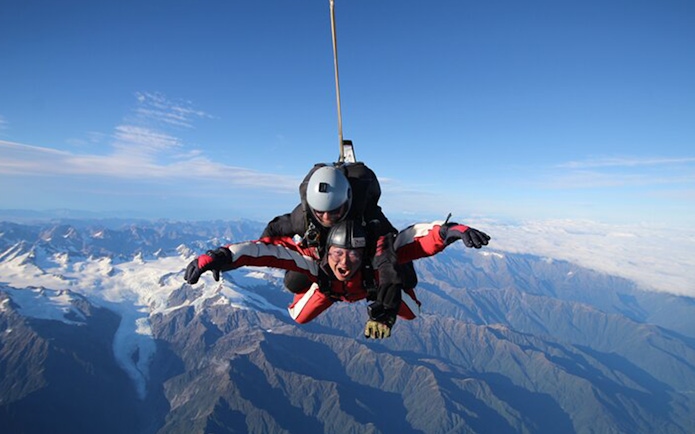 Skydiving over Franz Josef Glacier, New Zealand, with tandem instructor.