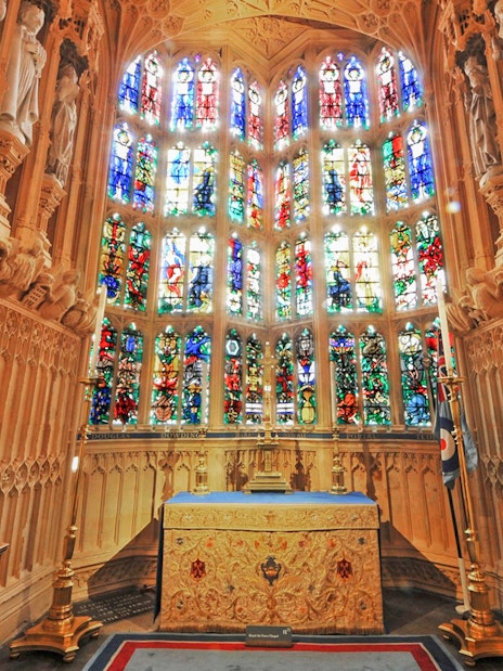 Stained glass windows inside Westminster Abbey, London.