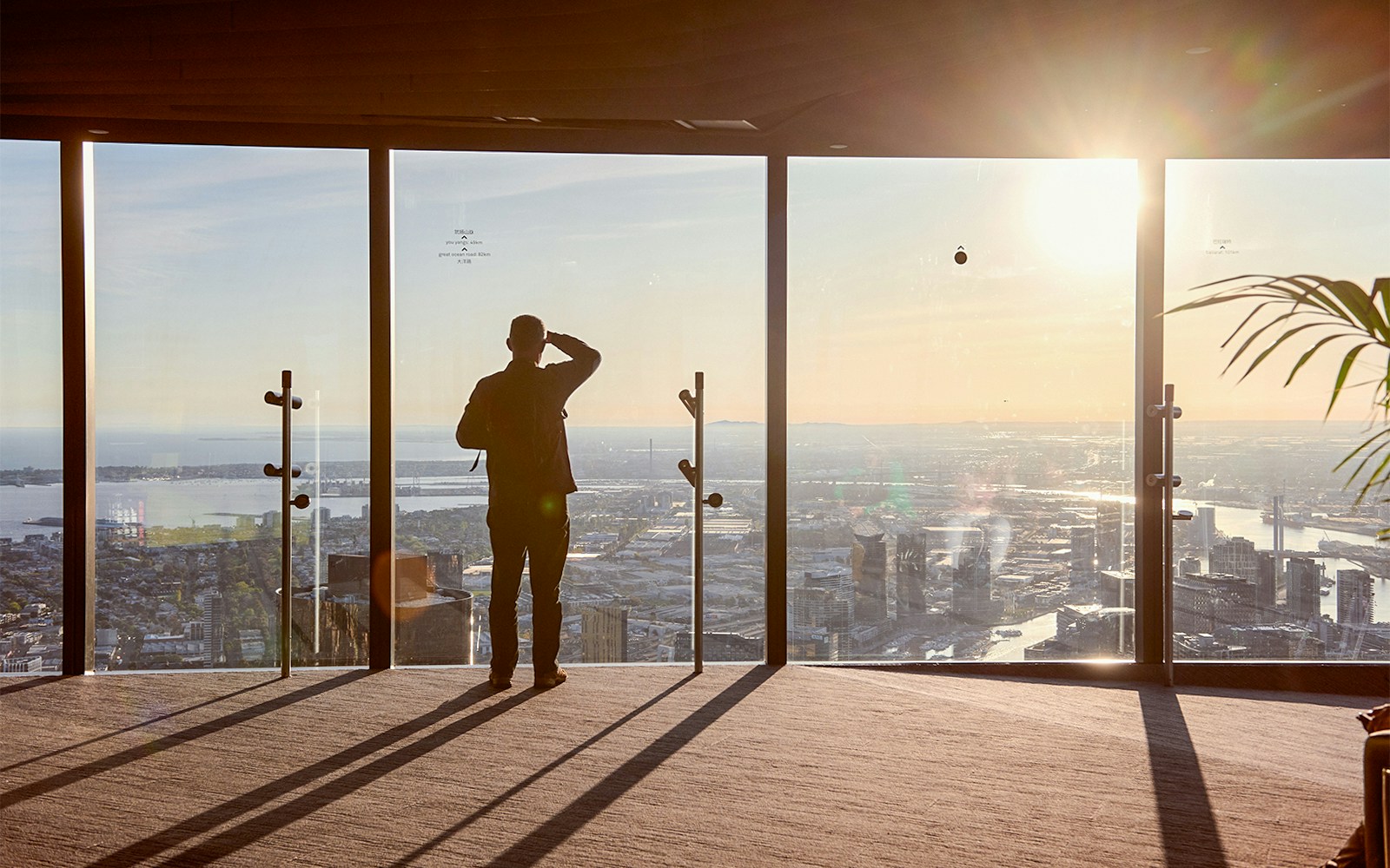 Viewing Melbourne from Eureka Tower Skydeck at sunset.