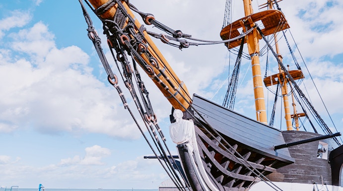 Frigate D. Fernando II e Glória docked with visible masts and rigging, Lisbon, Portugal.