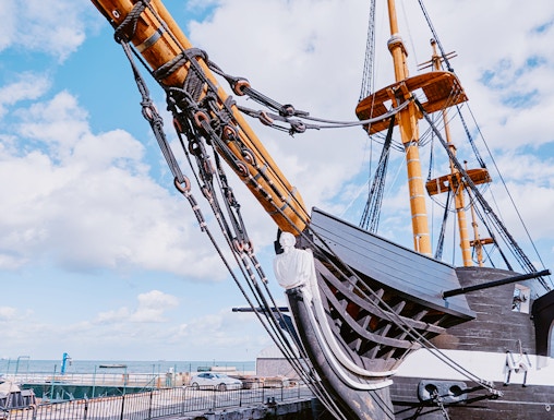 Frigate D. Fernando II e Glória docked with visible masts and rigging, Lisbon, Portugal.
