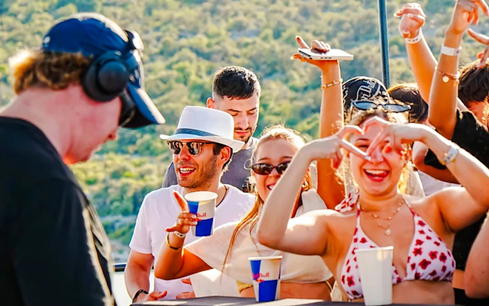 Guests dancing and enjoying drinks on Blue Lagoon Yacht Party from Split.