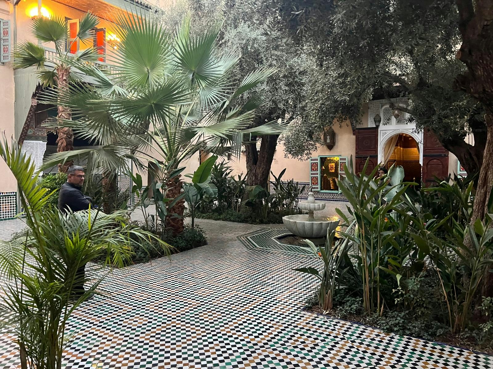 Courtyard with mosaic tiles and fountain at Moroccan Culinary Arts Museum.