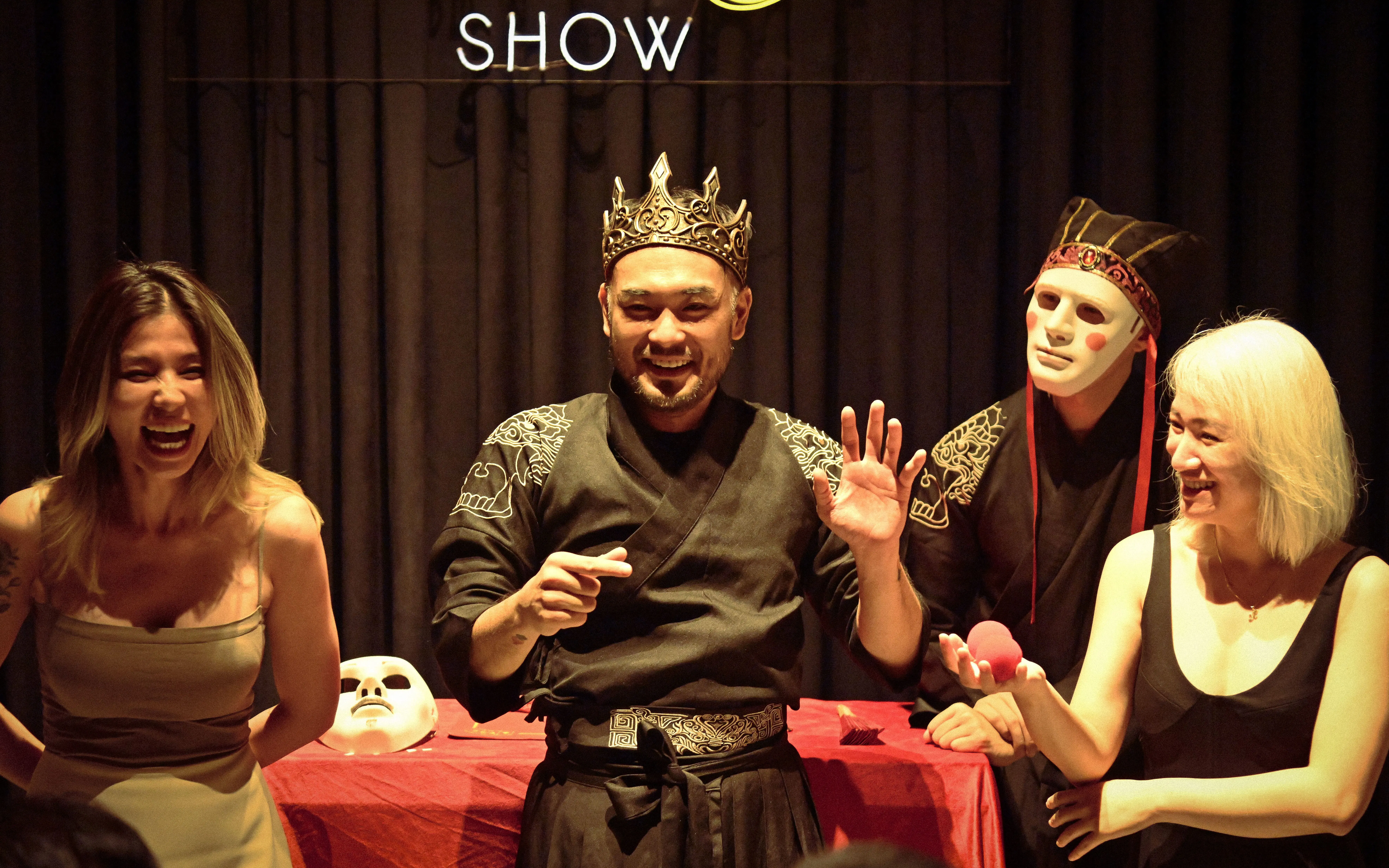 Magician and audience enjoying Mystic Night Show in Ho Chi Minh City.