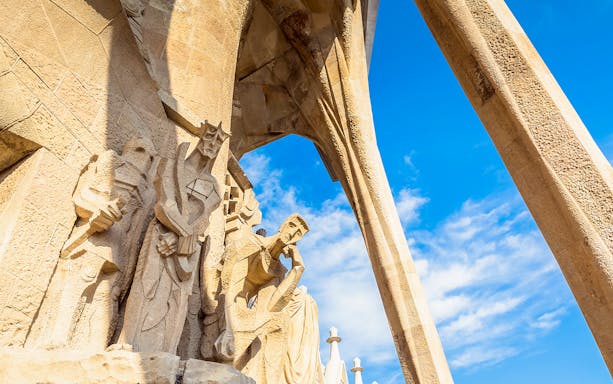 Sagrada Familia exterior with intricate spires in Barcelona, highlighting architecture during opening hours.