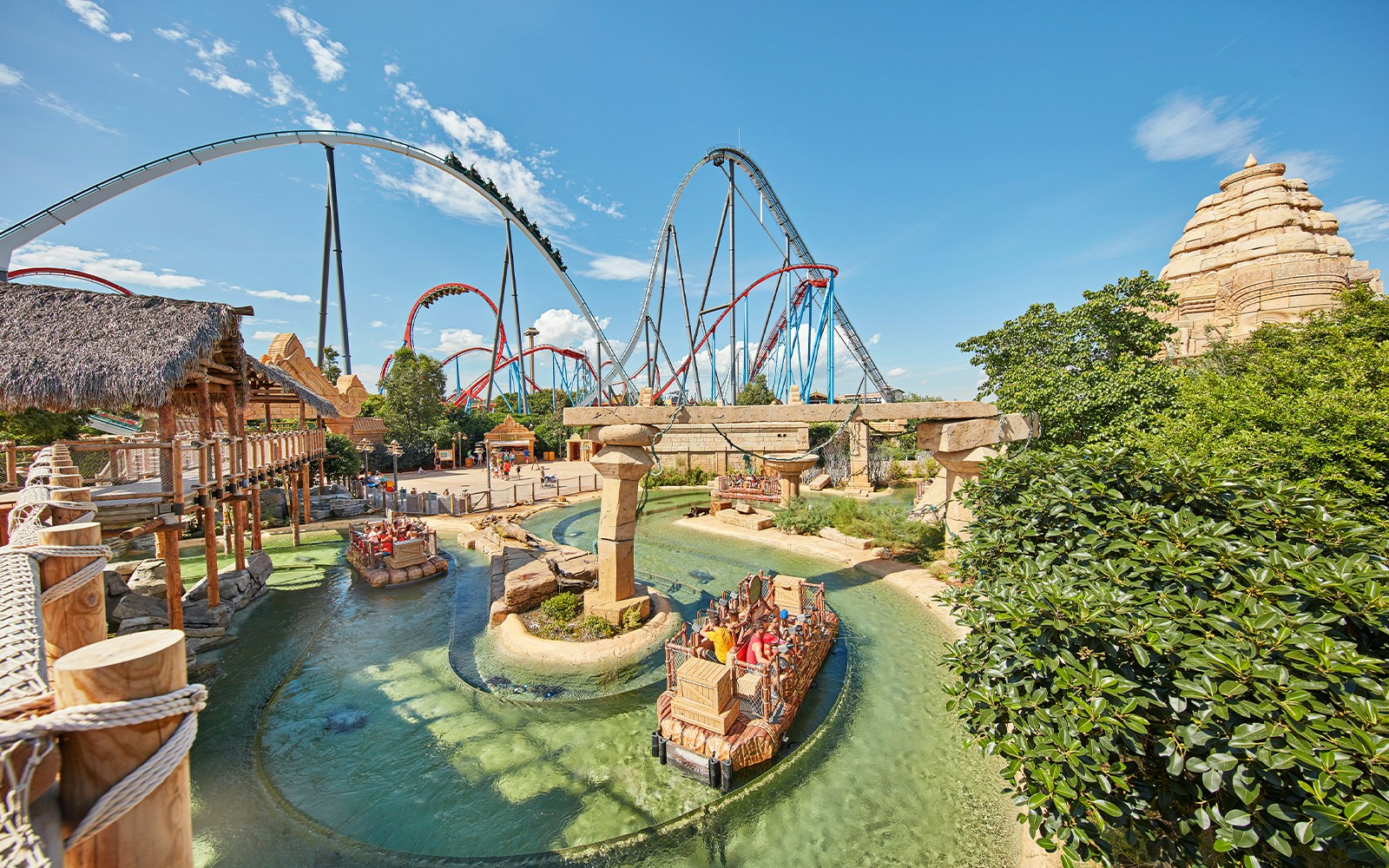 River ride and roller coasters at PortAventura Park, Spain.