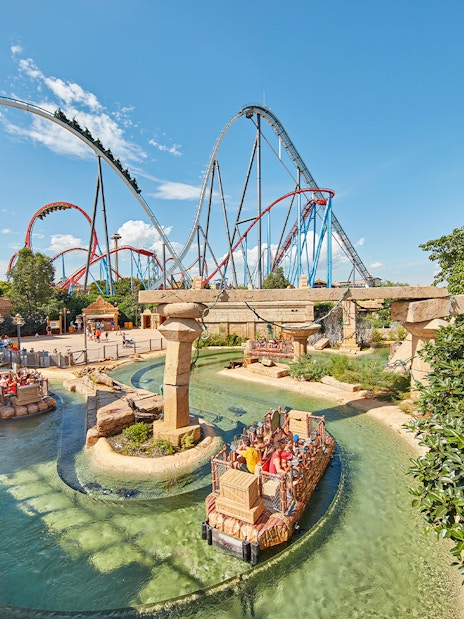 River ride and roller coasters at PortAventura Park, Spain.