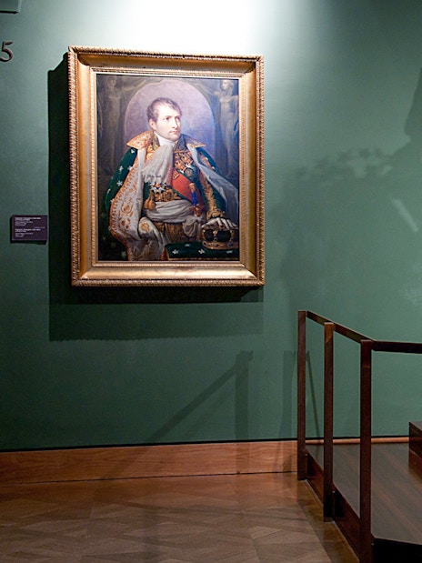 Portrait and imperial cradle display at Imperial Treasury Vienna.