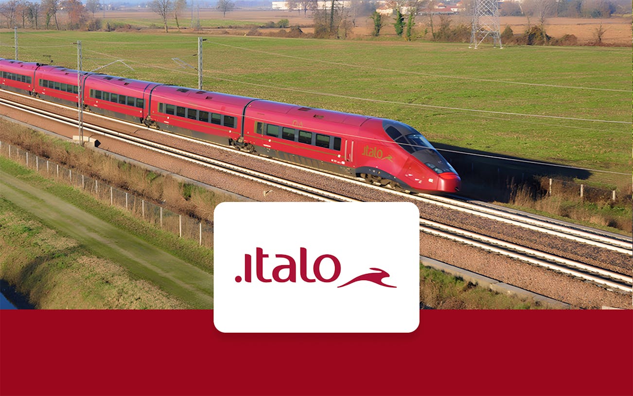 High-speed Italo train traveling through countryside between Milan and Venice.