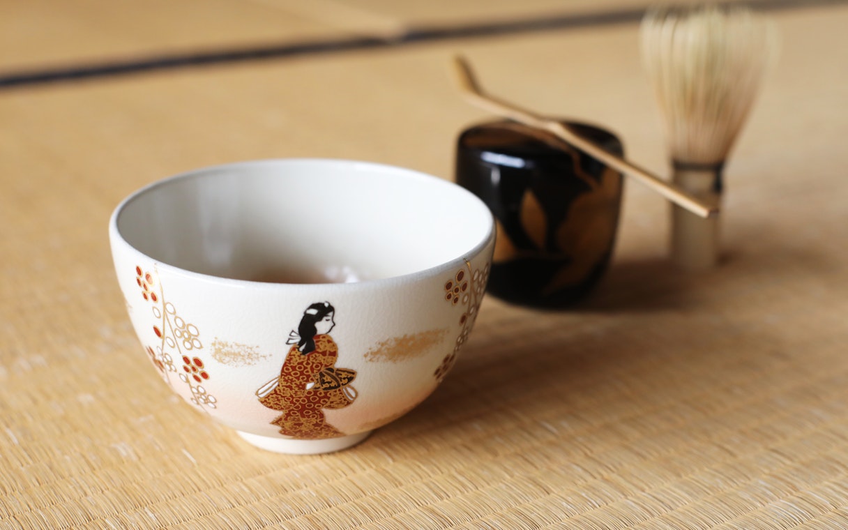 Japanese Chawan with traditional design for tea ceremony on tatami mat.