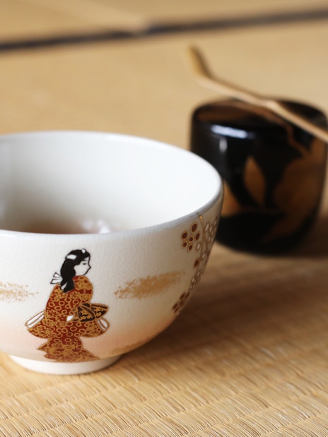 Japanese Chawan with traditional design for tea ceremony on tatami mat.