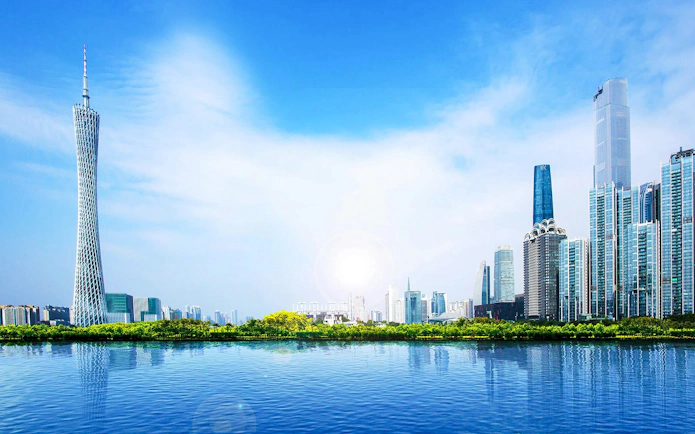 Canton Tower and Guangzhou skyline reflected in the Pearl River.