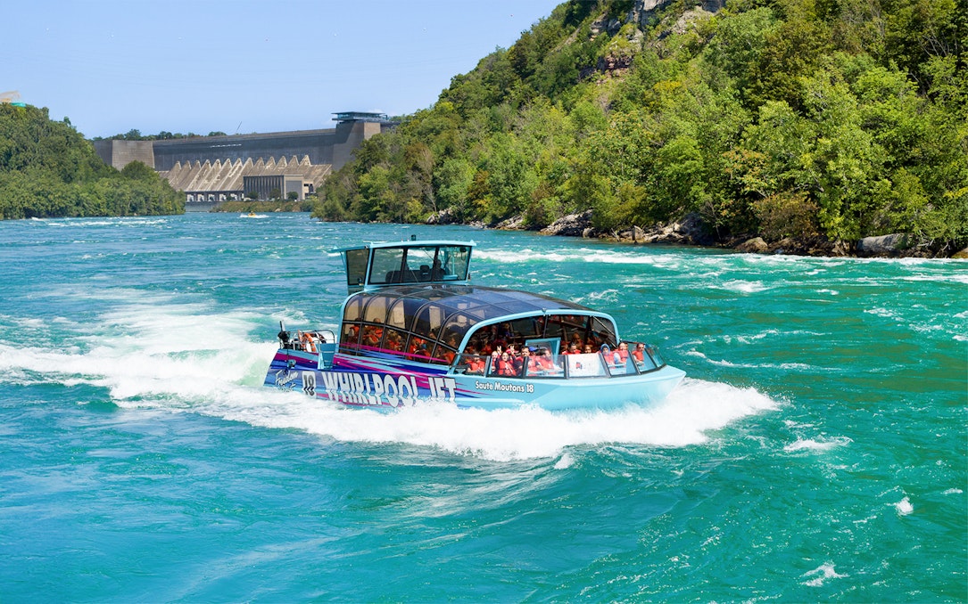 Guests enjoying the Freedom jet boat tour on the Niagara River Gorge, Niagara, Canada.