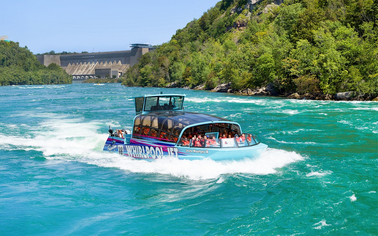 Guests enjoying the Freedom jet boat tour on the Niagara River Gorge, Niagara, Canada.