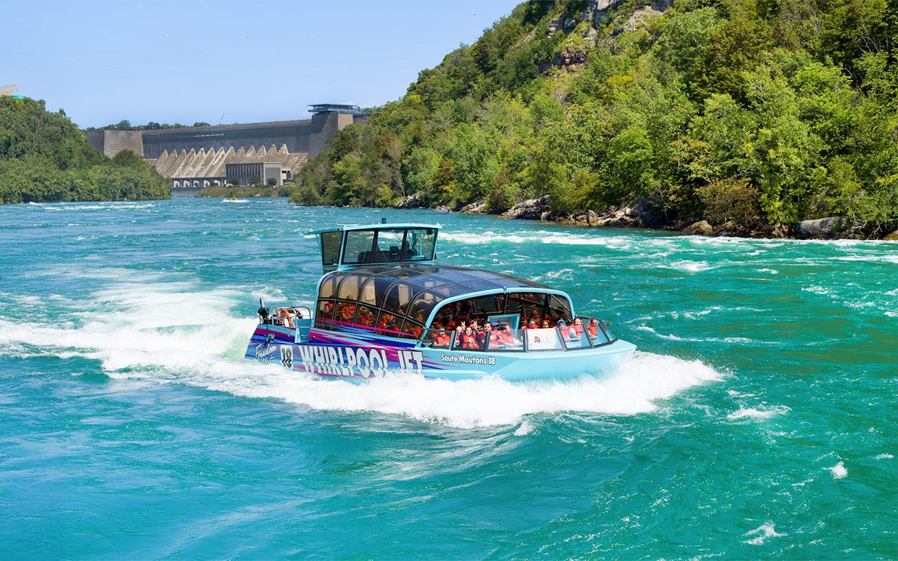 Guests enjoying the Freedom jet boat tour on the Niagara River Gorge, Niagara, Canada.