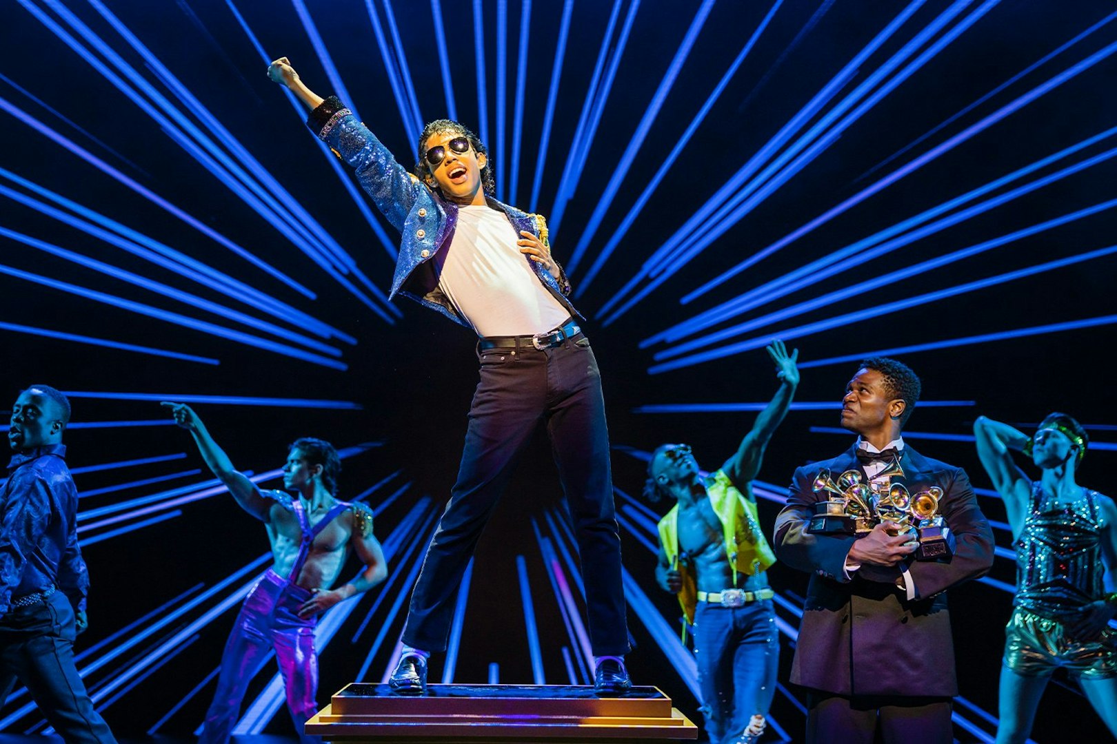 Stage performance of MJ the Musical in Brisbane with dancers and vibrant lighting.