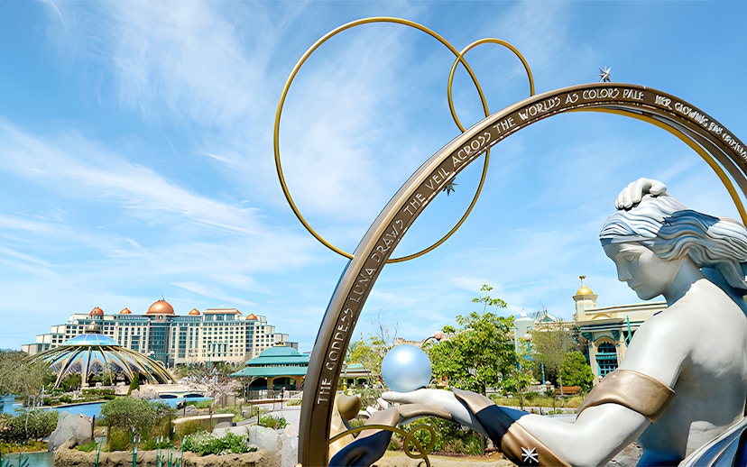 Goddess Luna statue with celestial arch at Epic Universe, Universal Orlando, Florida.