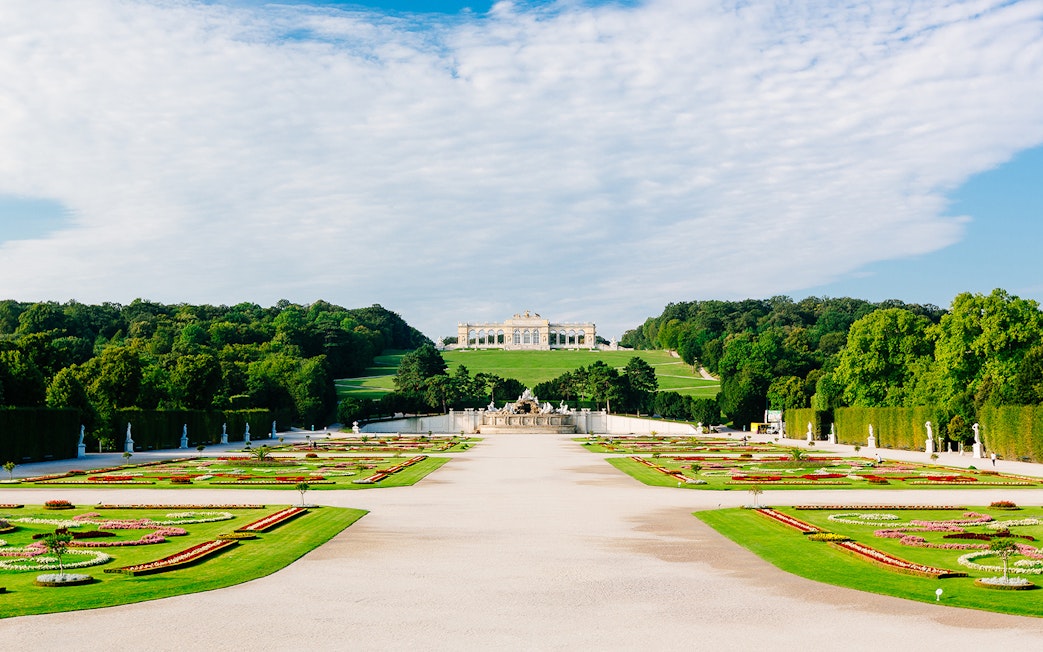 Gardens of the Schönbrunn Palace with the Gloriette in the background, Vienna.