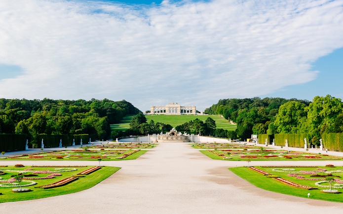 Gardens of the Schönbrunn Palace with the Gloriette in the background, Vienna.