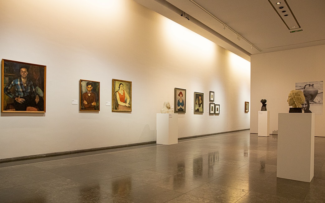 Art gallery with portraits and sculptures at the National Museum of Contemporary Art.