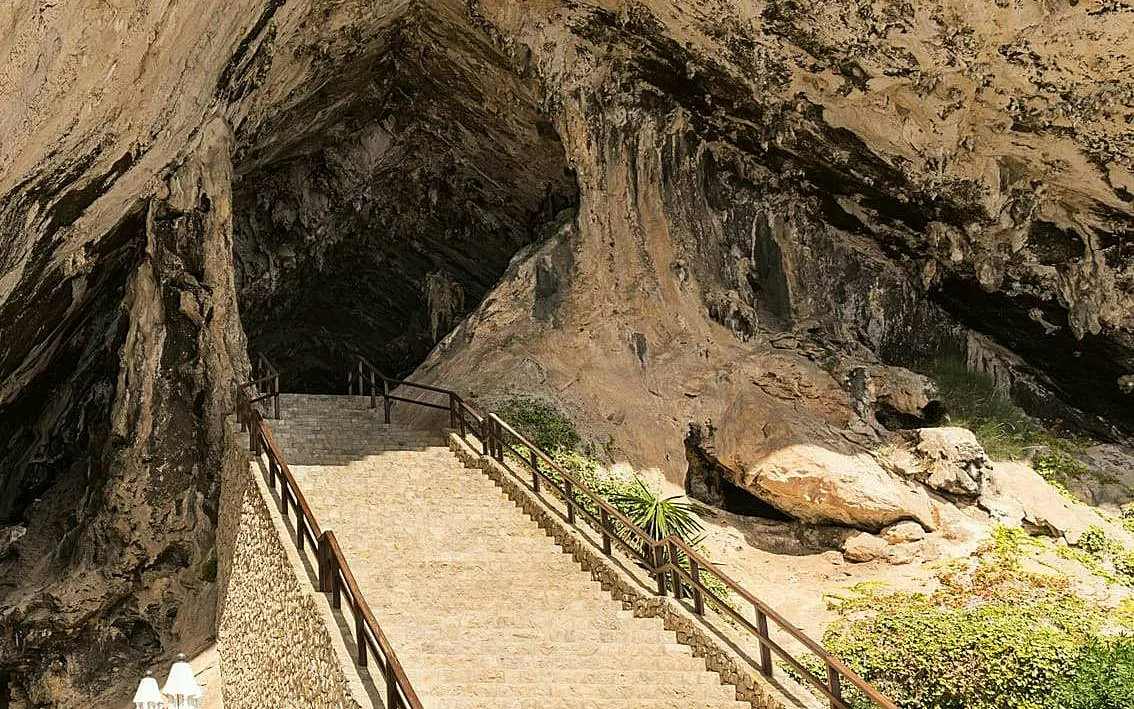 Stone staircase leading to the entrance of Coves d'Artà, Mallorca, Spain.
