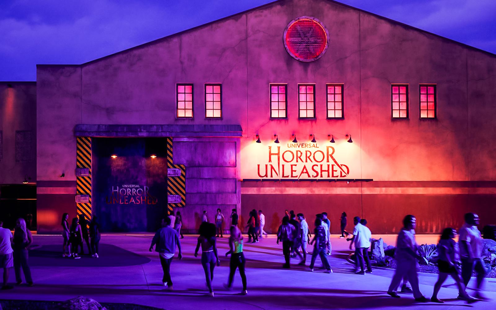 Entrance to Universal Horror Unleashed in Las Vegas with visitors walking.