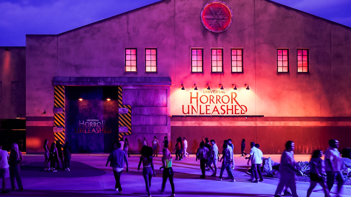 Entrance to Universal Horror Unleashed in Las Vegas with visitors walking.