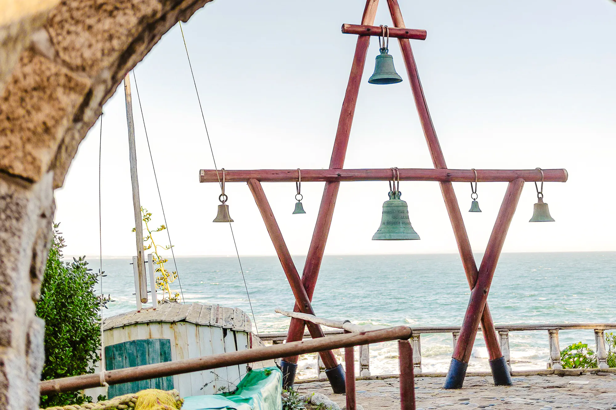 Bells overlooking the ocean at Isla Negra, part of the Santiago day tour.